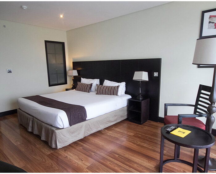 Bed room in Mount Meru Hotel