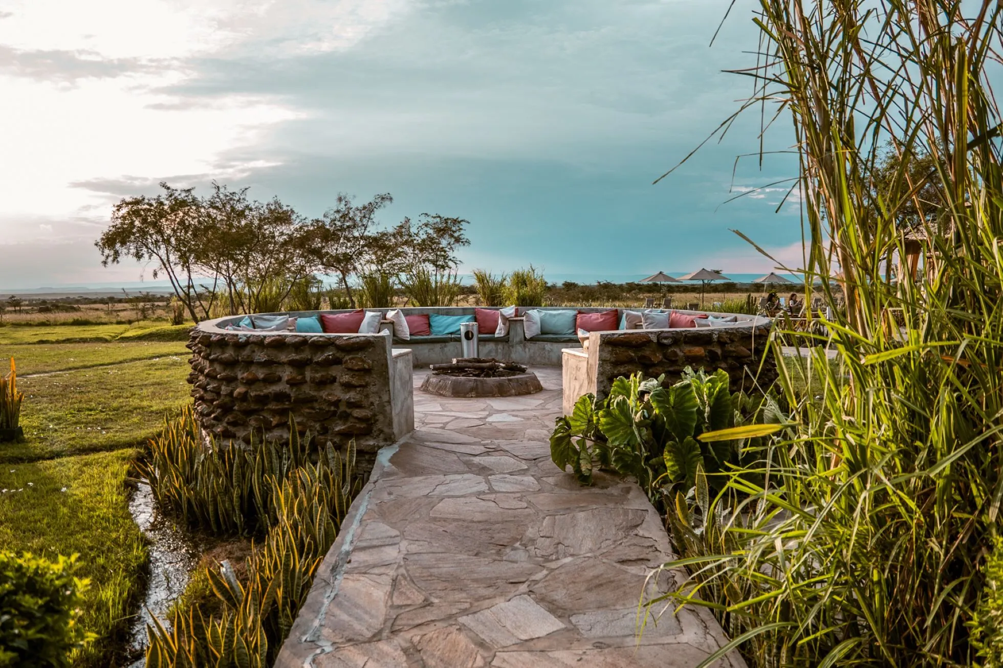 IM_KE_MAR_Zebra-Plains-Mara-Camp_Fireplace-and-sofa.webp